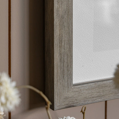 Gallery Direct Abstract Framed Art, close-up of the grey brown frame in a styled interior