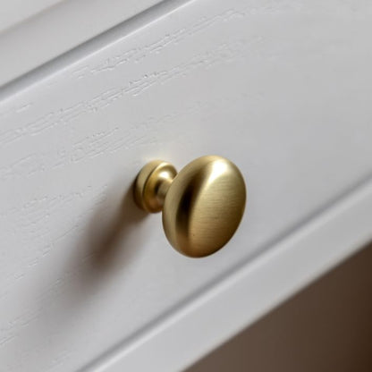 Gallery Direct Acton 2 Drawer Console table in White with subtle wood grain effect and round gold coloured drawer knobs