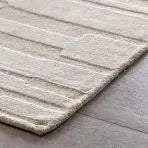 The Albany Tufted Tonal Rug from Gallery Direct measures 2000x2900mm and features an intricate abstract design within the plush pile