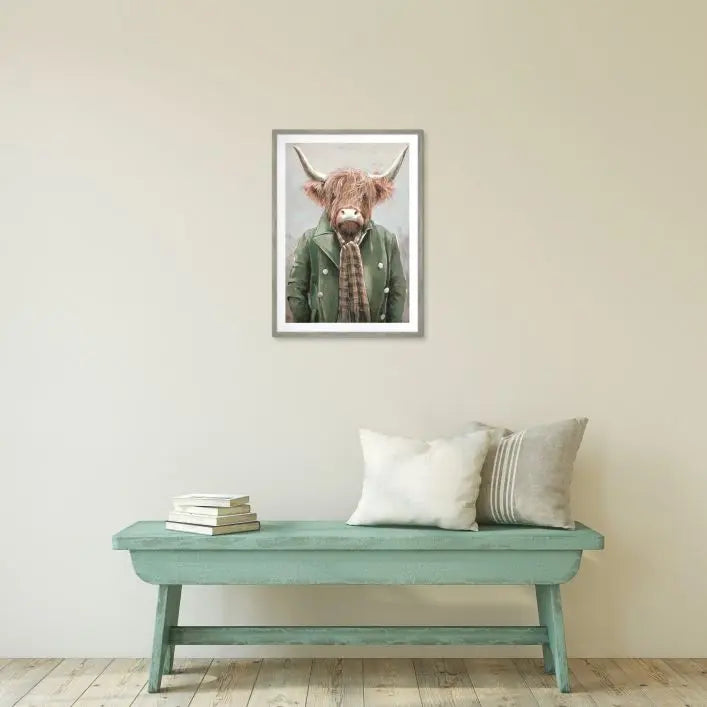 Gallery Direct Angus Framed Artwork of a highland cow in a jacket and scarf with a grey wood effect frame by the artist Adelene Fletcher