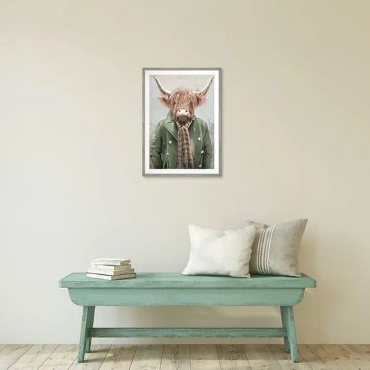 Gallery Direct Angus Framed Artwork of a highland cow in a jacket and scarf with a grey wood effect frame by the artist Adelene Fletcher