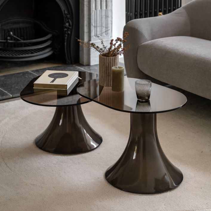Gallery Direct Anzio Large Side Table is an Italian inspired design with a subtly tinted toughened glass table top, and a charcoal brown glazed GRC base, a smaller side table is also available