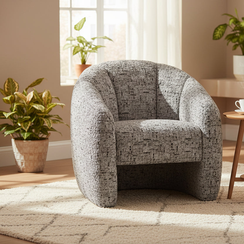 Gallery Direct Atella Curved Tub Chair in Tula Monochrome designed upholstery with vertical stitching on the backrest 