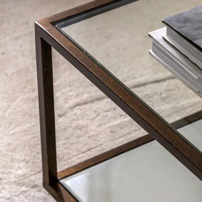 Gallery Direct Avento Coffee Table features a glass table top and a lower mirrored shelf set within a bronzed metal frame