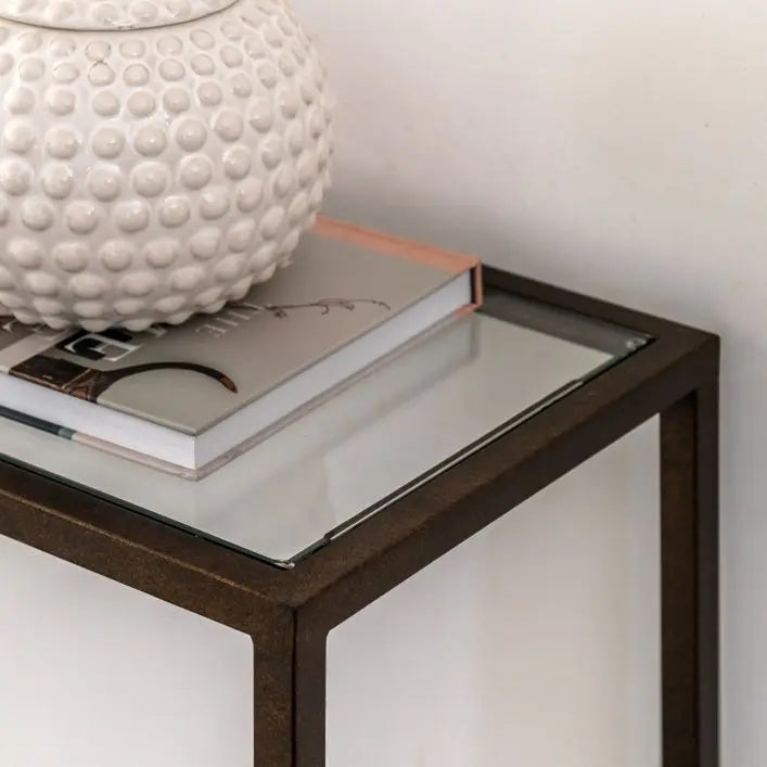 Gallery Direct Avento Console Table features a modern industrial designed metal frame with a pristine glass table top