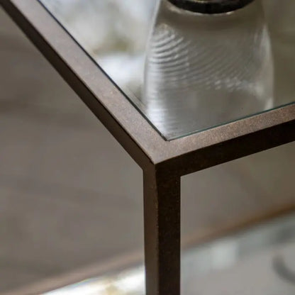 Gallery Direct Avento Side Table with a bronze colour metal frame and glass table top