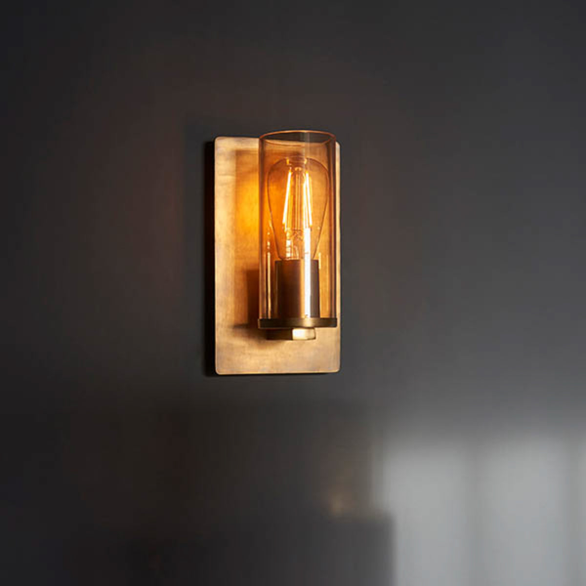 Gallery Direct Ayla Wall Light Antique Bronze, styled in a room setting