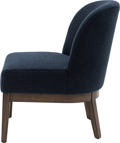 Gallery Direct Bardfield Accent Chair Upholstered in a deep Blue boucle style fabric with dark oak wooden frame and legs