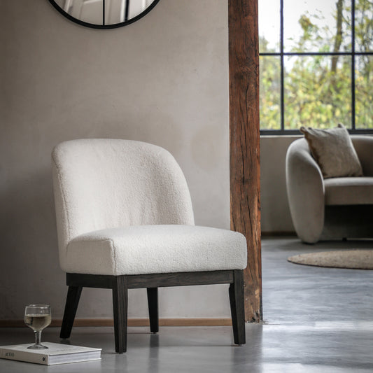Gallery Direct Bardfield Accent Chair Upholstered in a Vanilla coloured boucle style fabric with dark oak wood underframe and legs