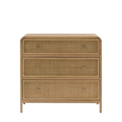 The Gallery Direct Bibury 3 Drawer Chest is constructed from oak and pine wood veneers with a soft lime wash finish, rattan detailing to the drawer fronts with bronzed metal handles