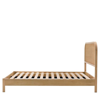 Gallery Direct Bibury Double Bed made with oak and pine wood and veneers in a soft lime wash finish, with wooden slats and a rattan design headboard