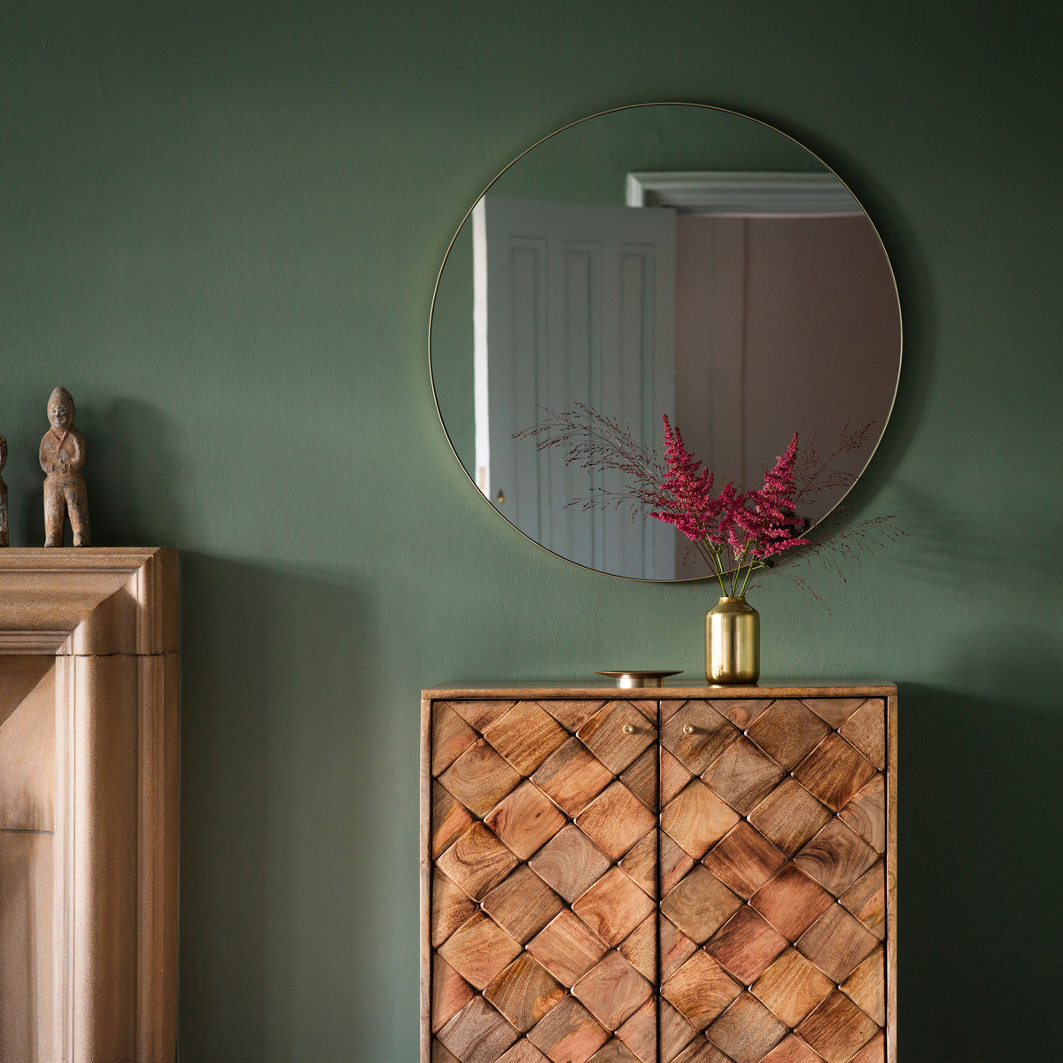 Gallery Direct Bowie Round Mirror Champagne displayed in a styled interior