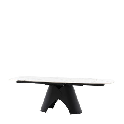 Gallery Direct Bresso Extending Dining Table with a matt black metal base and  a Carrara marble style ceramic table top