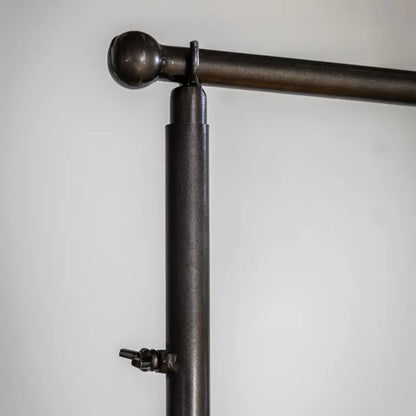 Gallery Direct Brogdale Hanging Bar finished in a sleek Black iron, with adjustable design for functionality