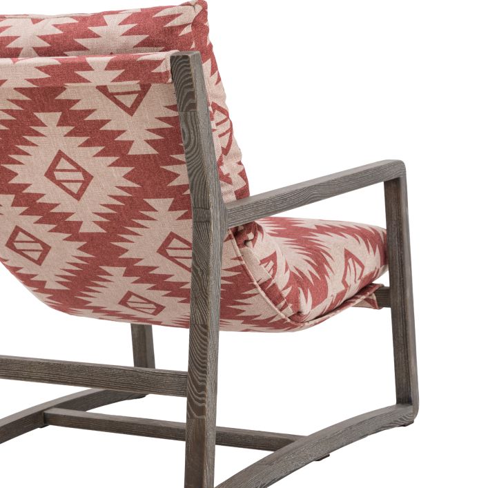 Gallery Direct Burela Lounge Chair in a red/natural colour Mira Aztec patterned fabric with a sturdy dark wooden frame