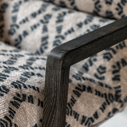 Gallery Direct Burela Lounge Chair in Obi Diamond padded fabric with a rich dark wooden frame