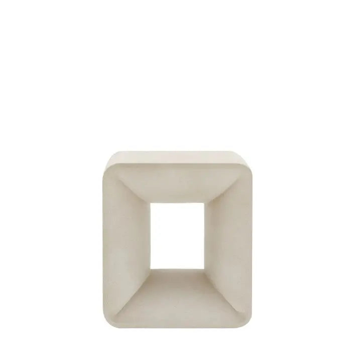 The Gallery Direct Caluso Side Table is a statement piece constructed from GRC, with curved contours and a matt linen surface 