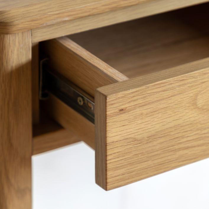 Gallery Direct Camden Console Table features 2 Top Drawers with slim wooden handles, finished in a natural warm wood-grain 