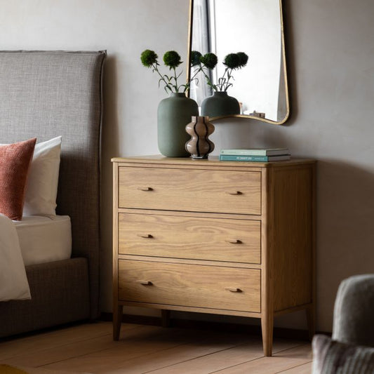 Gallery Direct Camden 3 Drawer Chest in a Natural warm wood grain finish, with matching slim wooden handles and tapered legs  