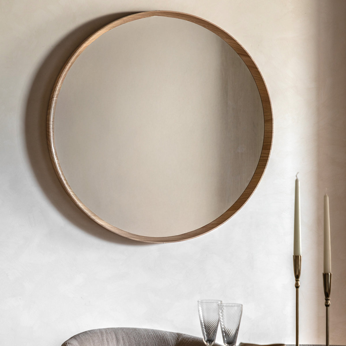 Gallery Direct Cedar Round Mirror Oak displayed in a styled interior