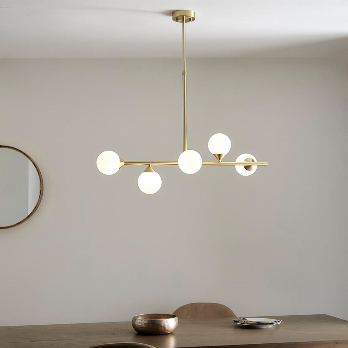 Gallery Direct Celeste 5 Linear Pendant Light Satin Gold, styled in a room setting