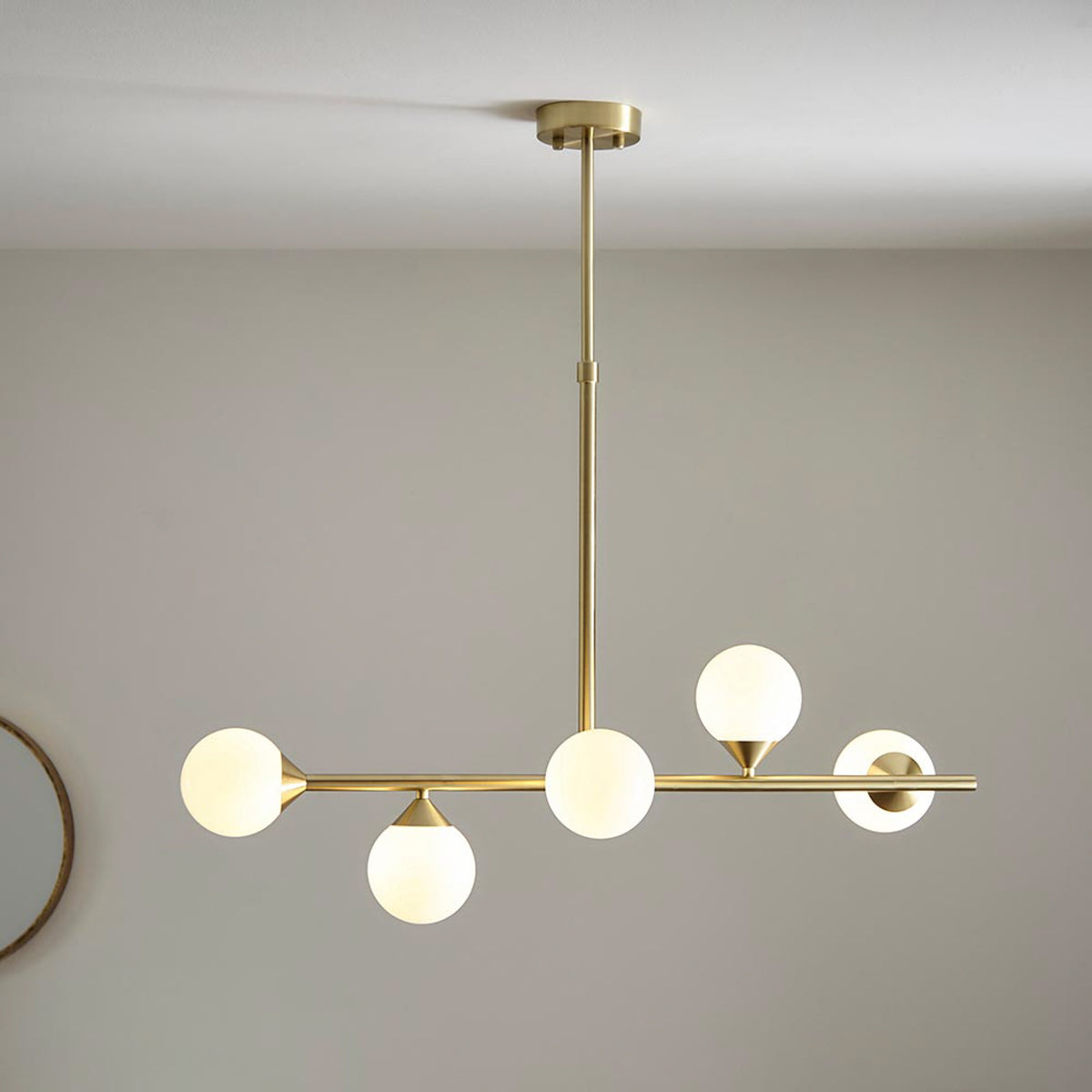 Gallery Direct Celeste 5 Linear Pendant Light Satin Gold, styled in a room setting