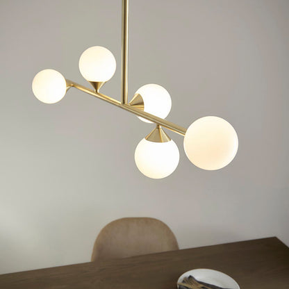 Gallery Direct Celeste 5 Linear Pendant Light Satin Gold, styled in a room setting
