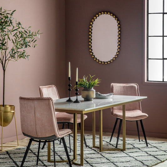 Gallery Direct Ceretti Mirror Gold displayed in a styled interior