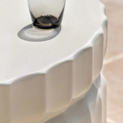 Gallery Direct Cirella Coffee Table is made using GRC and is finished in a Creamy glaze on the sculptural base