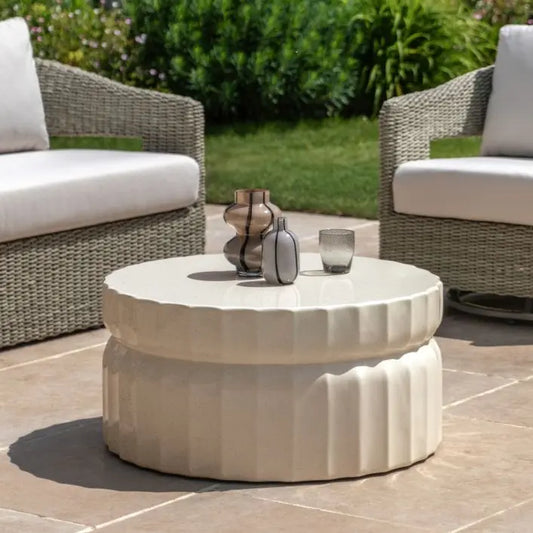 Gallery Direct Cirella Cream Coffee Table crafted from glass reinforced concrete with an all round ridged design that can be used both indoor and outdoors