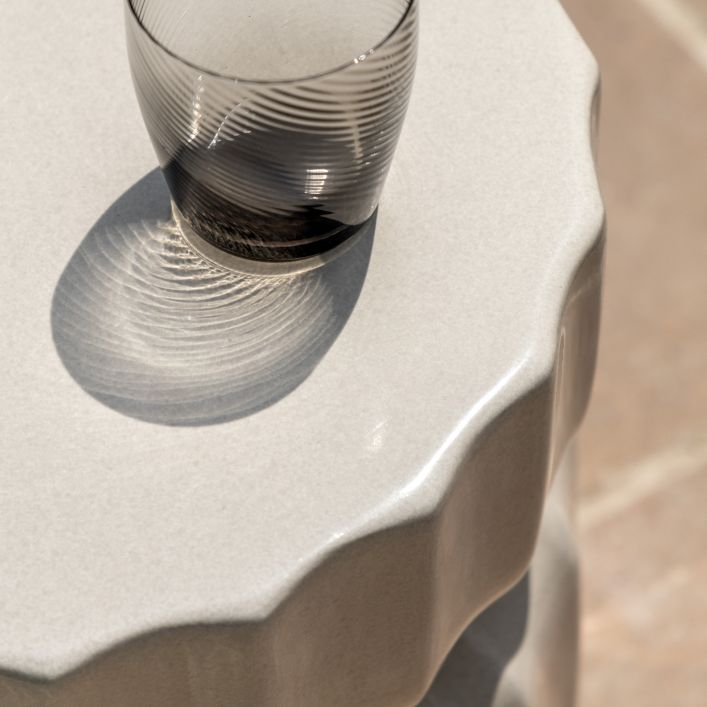 Gallery Direct Cirella Side Table in Cream is suitable for indoor and outdoor use due to its durable construction using GRC 