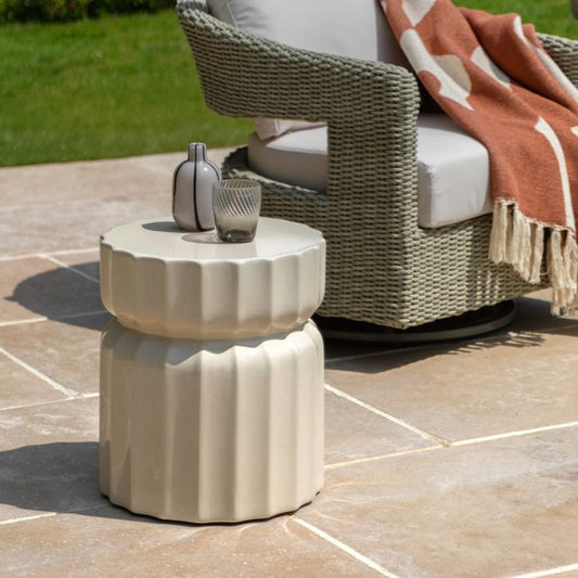Gallery Direct Cirella Side Table features a distinctive ridge pattern, made using GRC for durability making it ideal for both indoor and outdoor use, and finish in a Creamy glaze