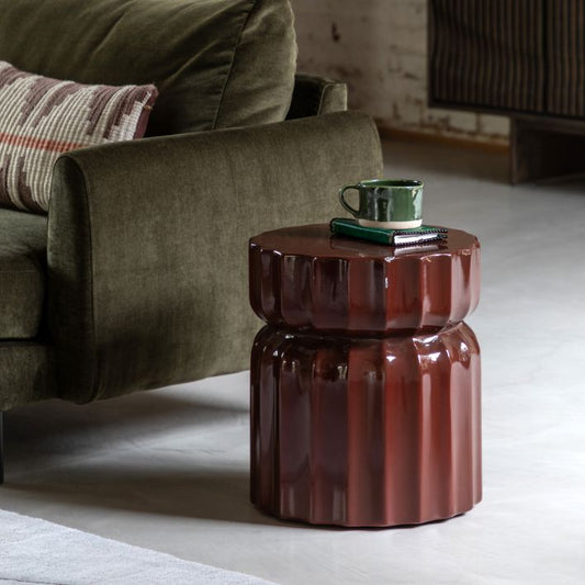 Gallery Direct Cirella Side Table is constructed from a durable glass reinforced concrete with a Rust brown glaze, and with a distinctive ridged design, this range is suitable for both indoors and outdoor use
