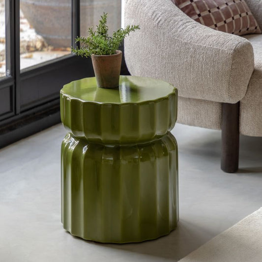 Gallery Direct Cirella Side Table is constructed from glass reinforced concrete making it suitable for either indoor or outdoor use, with a ridged pattern design that is glazed in a rich green Verde colour.