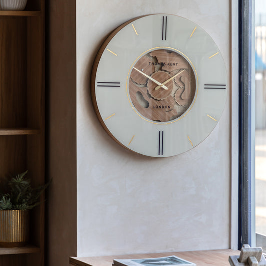 Gallery Direct Cogger Wall Clock Oak displayed in a styled interior