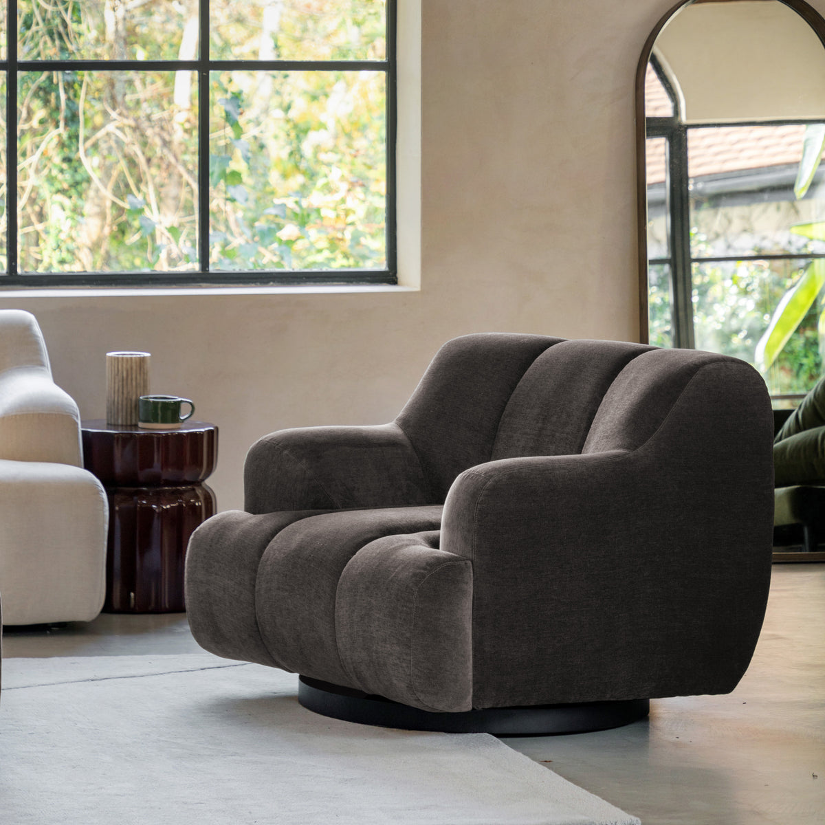 Gallery Direct Como Swivel Armchair styled in a living room