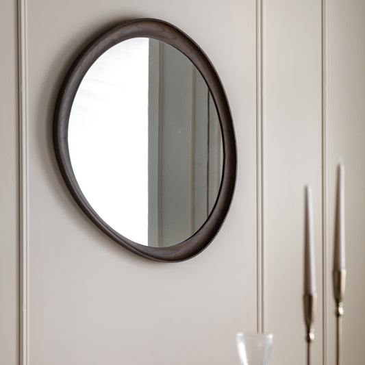 Gallery Direct Copenhagen Pebble Mirror Walnut displayed in a styled interior