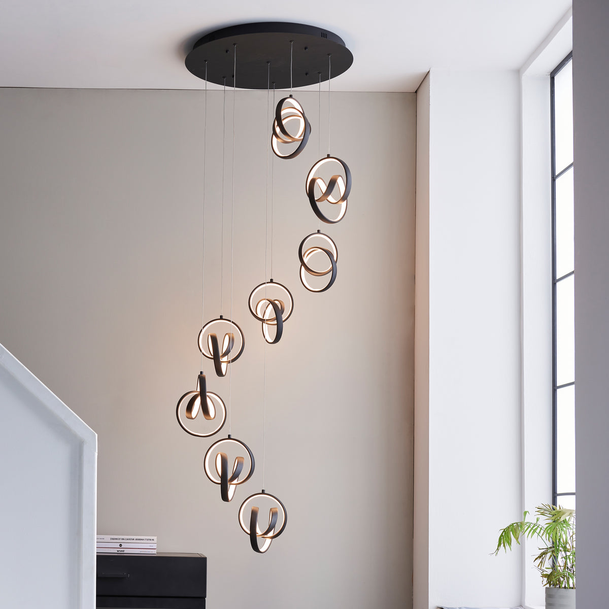 Gallery Direct Cosma 8 Pendant Light, styled in a room setting