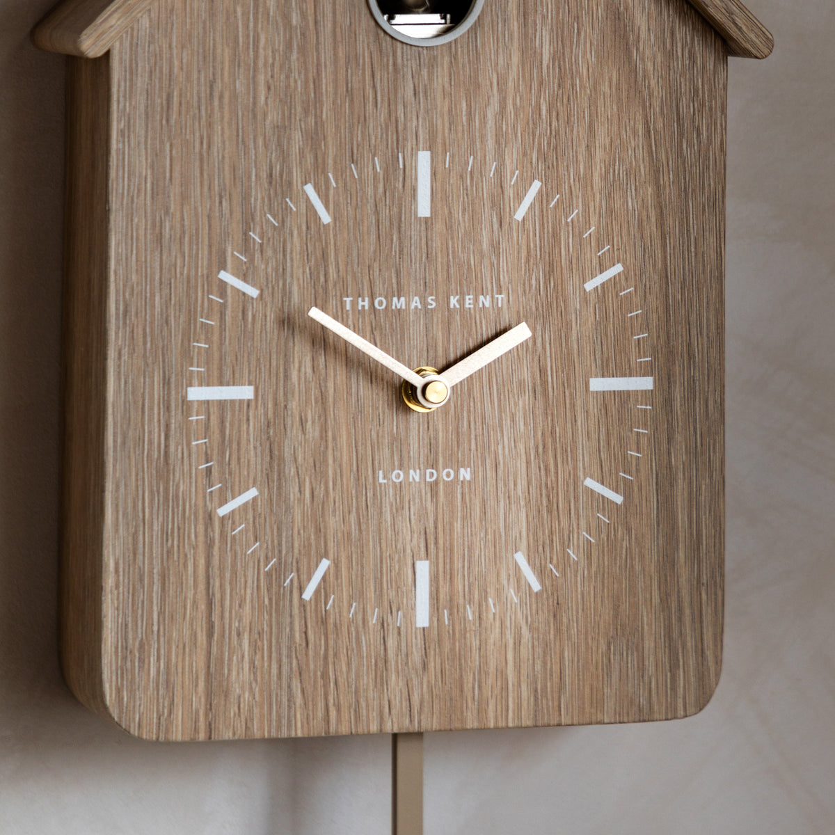 Gallery Direct Cuckoo Clock Oak, close-up of the clock face and finish
