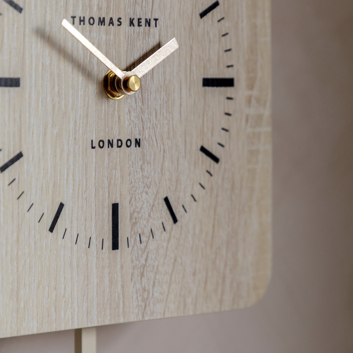 Gallery Direct Cuckoo Clock Washed Oak, close-up of the clock face and finish