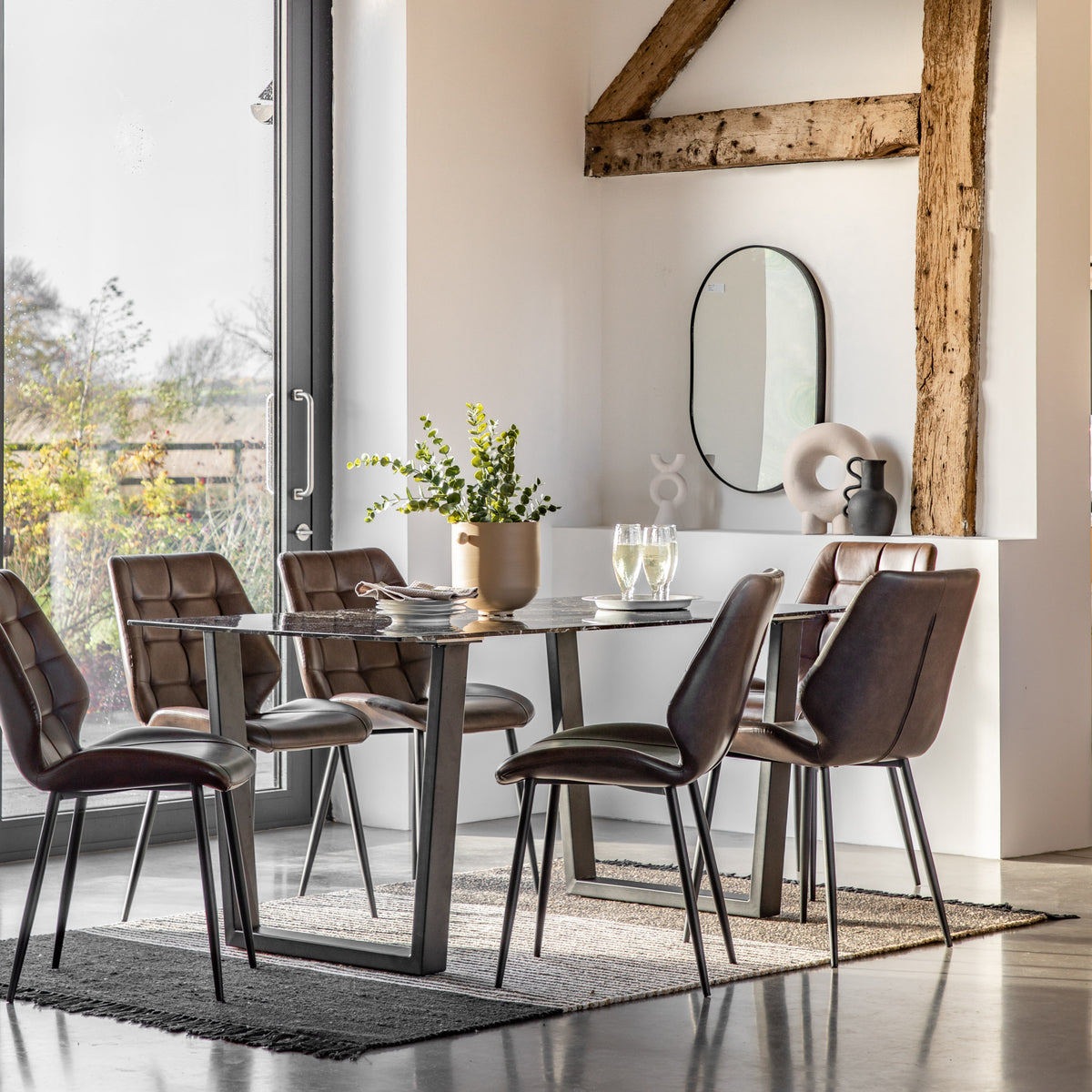 Gallery Direct Davidson Dining Table Black Effect styled with six chairs