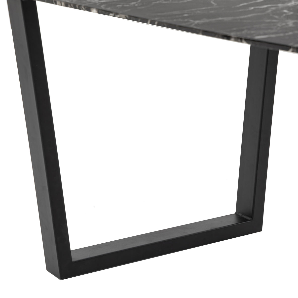 Close-up of the Davidson dining table angled black metal leg