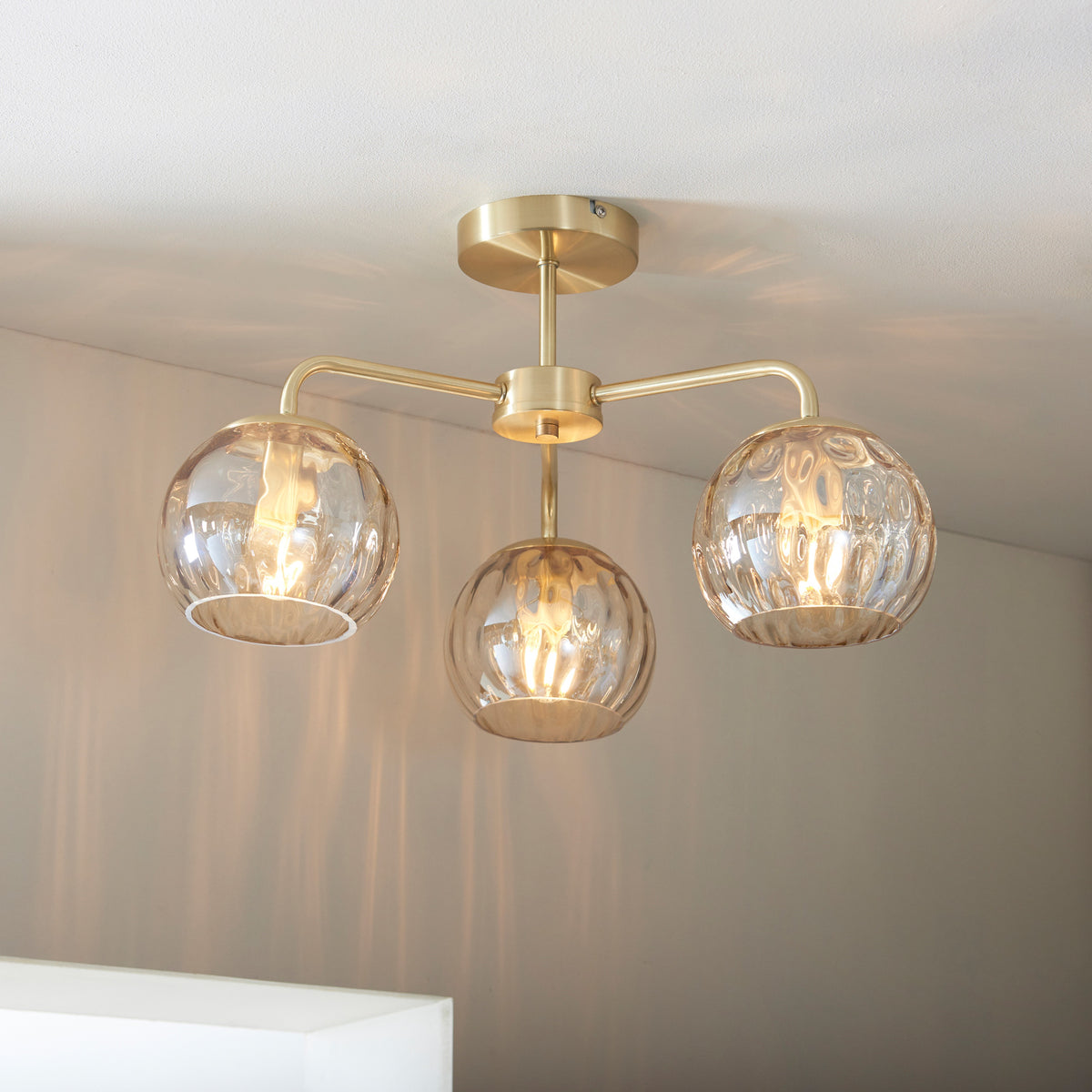 Gallery Direct Dimple 3 Ceiling Light, styled in a room setting