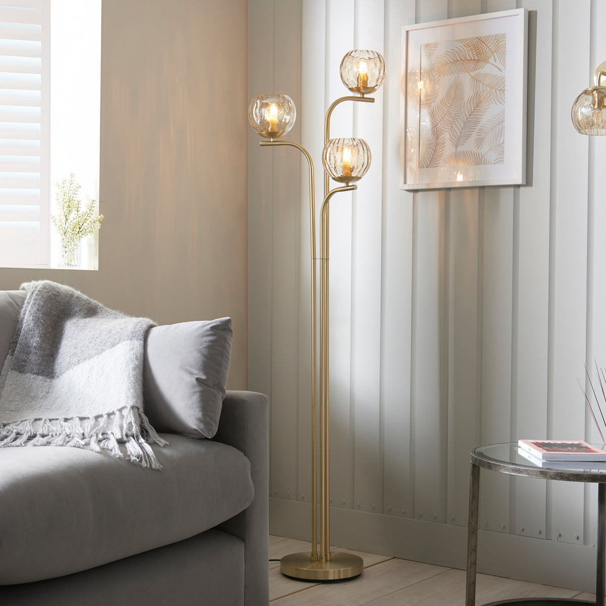 Gallery Direct Dimple 3 Floor Light, styled in a room setting