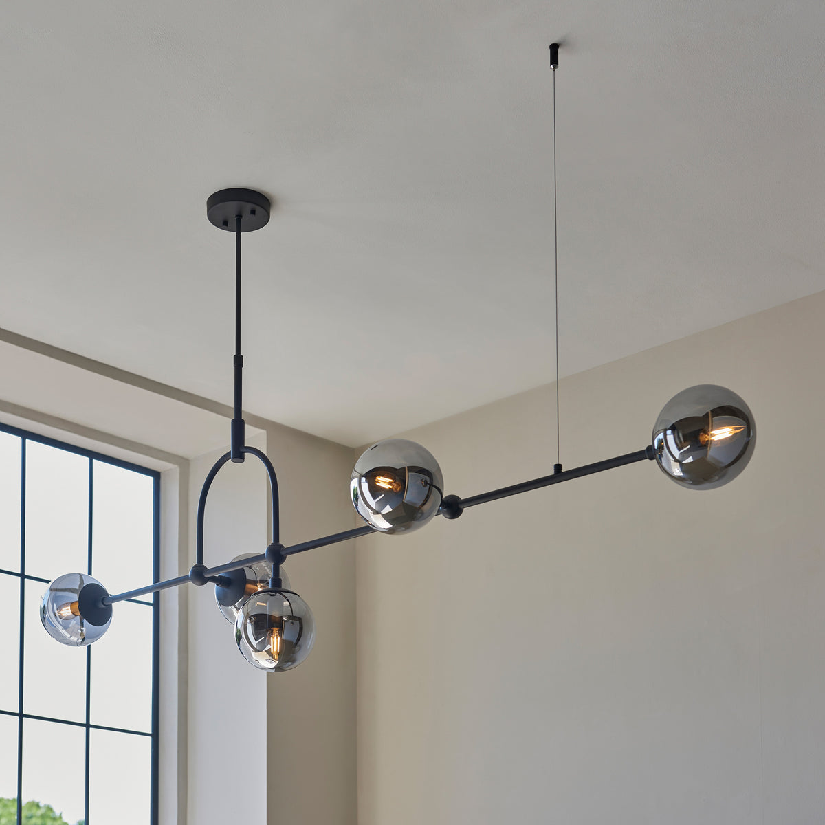 Gallery Direct Elara 5 Linear Pendant Light Matt Black, styled in a room setting