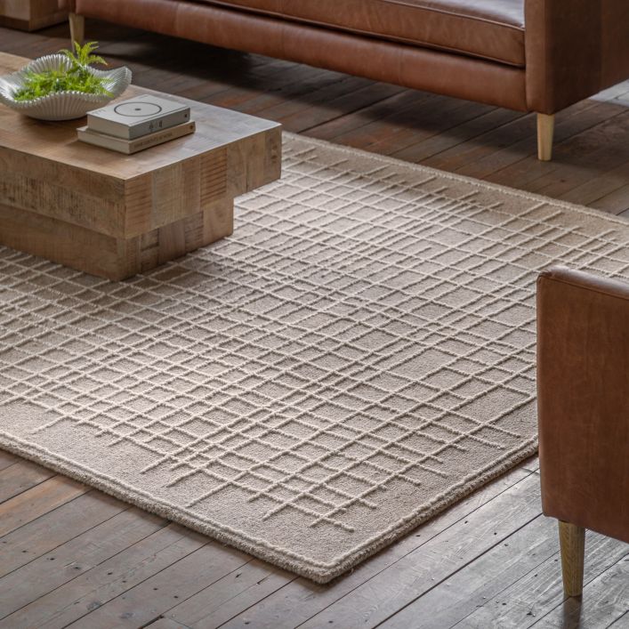 Gallery Direct Elmira Rug made from hand tufted wool and polyester mixed fibres for a plush pile, with a Linear design in natural cream colours, measures 1600x2300mm
