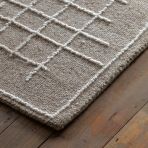 Gallery Direct Elmira Hand Tufted Rug, measures 2000x2900mm in a natural cream colour with linear design