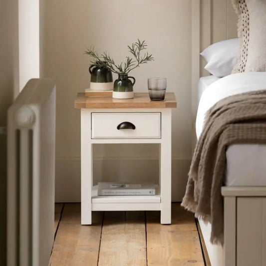 Gallery Direct Eton 1 Drawer Bedside Cabinet with a lower shelf, constructed in White painted wood with a natural oak effect rectangular table top 