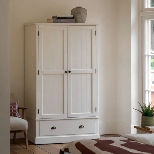 Gallery Direct Eton White Wardrobe features a 2 door design with generous hanging space and a substantial lower storage drawer
