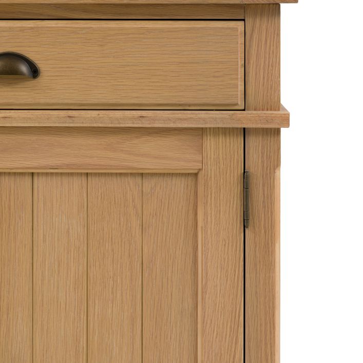 Gallery Direct Eton 2 Door 2 Drawer Sideboard in Natural oak wood finish with grooved panelled doors and metal handles